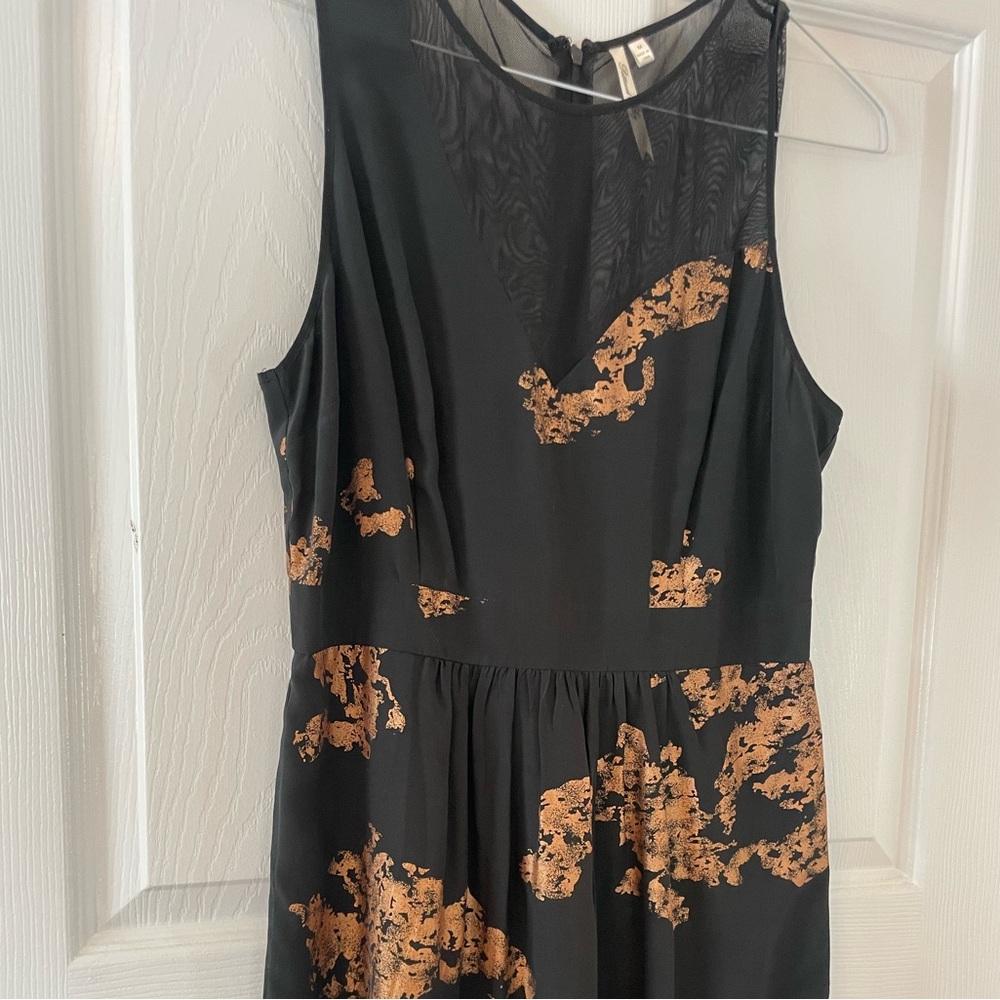New Petticoat Alley Silk Black and Gold Women's Dress with sheer cutout detail
